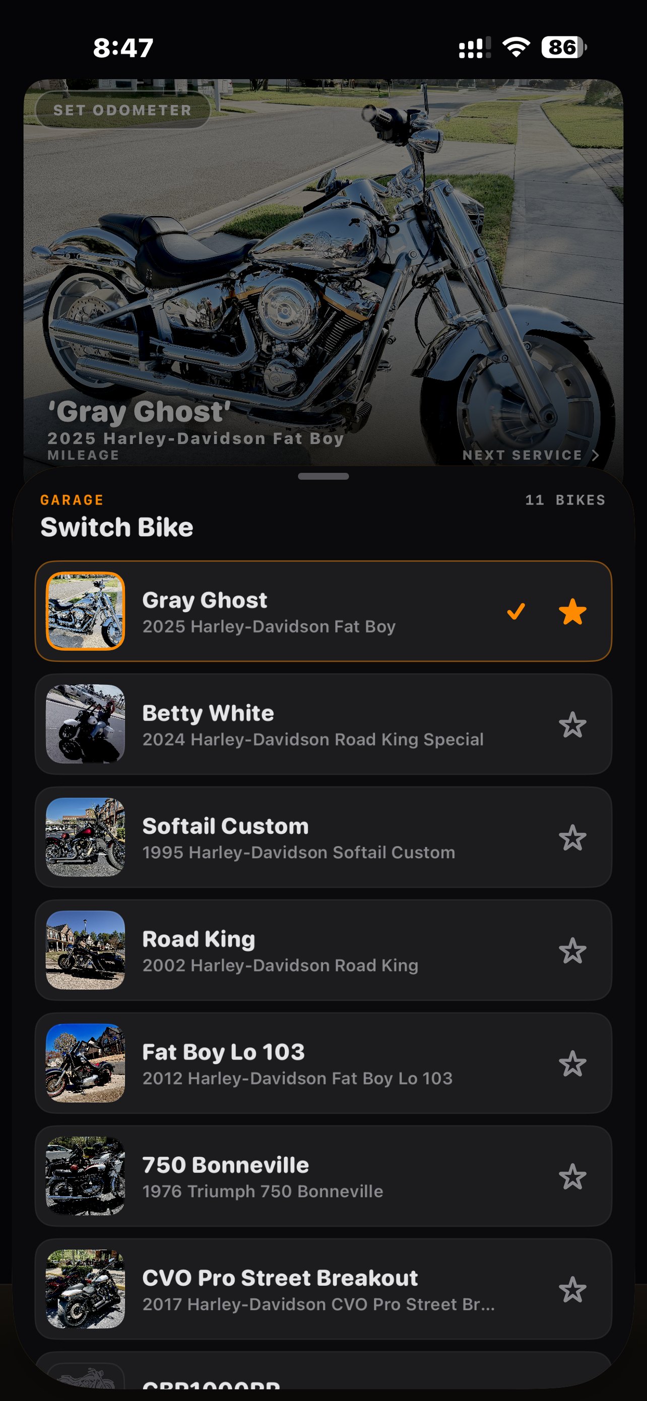 The Garage switcher listing seven bikes including Gray Ghost, Betty White, and a CBR1000RR